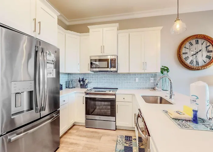 Pristine Waterfront Escape Just Steps To With Community Pool Washer Dryer Holiday home